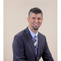 Agent JOHN MONIZ