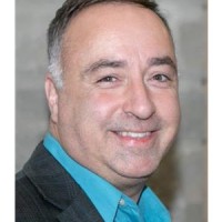Agent JOHN TEIXEIRA