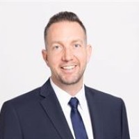 Agent JUSTIN DESECK