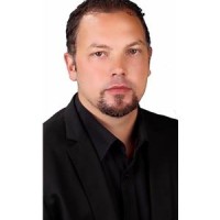 GREG BURKE TSAKMAKAS