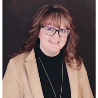 Agent Paula Grimes-Butler