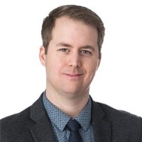 JUSTIN WOOLACOTT