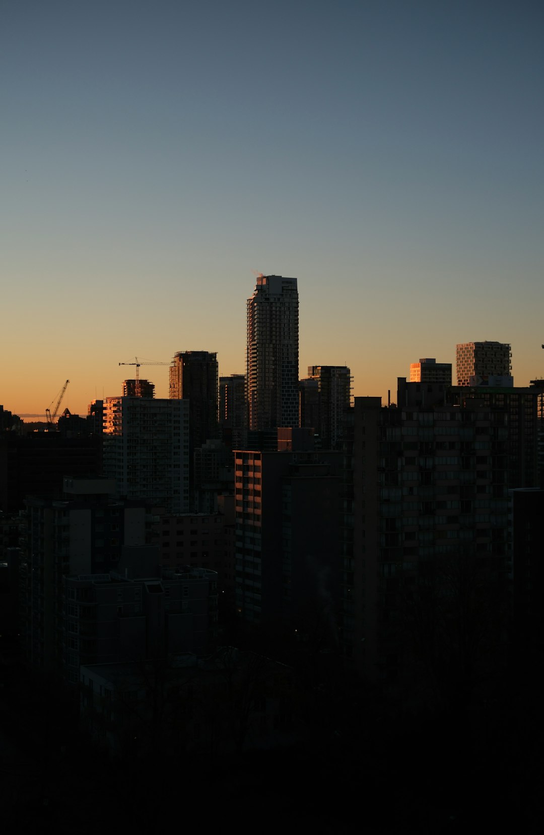 Luxury homes along Vancouver waterfront skyline