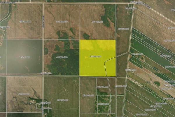 Aerial view highlighting one square land parcel in yellow with surrounding agricultural fields and roads. - 0 Bell Road, St Andrews
