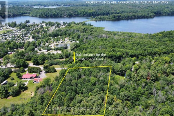 Aerial view of the property outlined in yellow, indicating the trail entrance for Marsh Bridge Dam. - 0 Graham Lake Road, Front Of Yonge
