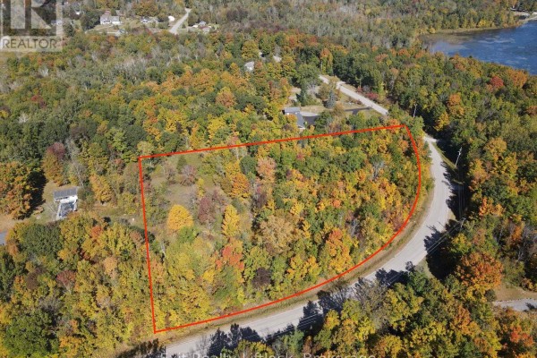 Aerial view of property with red boundary outline and road. - 0 Morningside Drive, Trent Hills