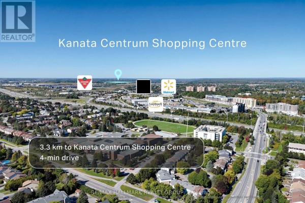 Aerial view showing the property's distance to Kanata Centrum Shopping Centre, including stores like Walmart and Canadian Tire. - 00 Bradley Side Road, Ottawa