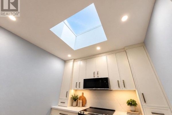 View up at a large square skylight in the kitchen ceiling. - 1 - 1727a Bayview Avenue, Toronto