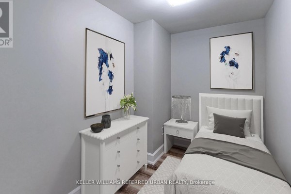 Small bedroom with a single bed, light gray walls, and decorative artwork, complemented by a dresser. - 1 - 783 Dufferin Street, Toronto