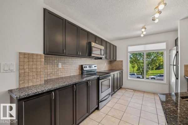 Kitchen - #1 1804 70 St Sw, Edmonton, AB T6X0H4 Photo 3