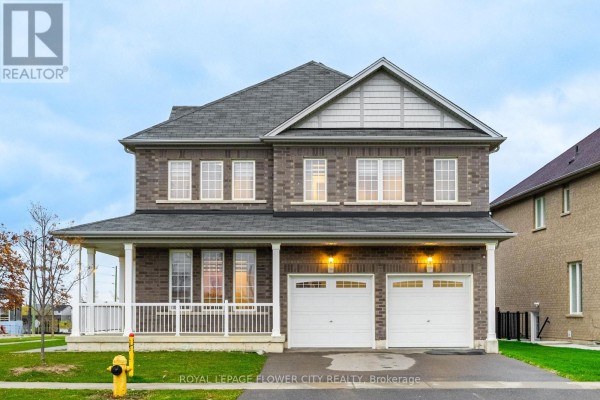Front view highlighting the double garage and large windows. - 1 Anderson Road, Brantford