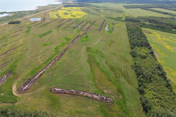 Aerial view of cleared land with tire tracks and rows of trees, Lake Manitoba Narrows. - 1 Reykjavik Road, Lake Manitoba Narrows