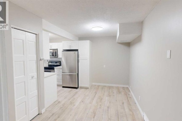 Living room - 10, 115 Lafayette Boulevard W, Lethbridge, AB T1K4A8 Photo 3