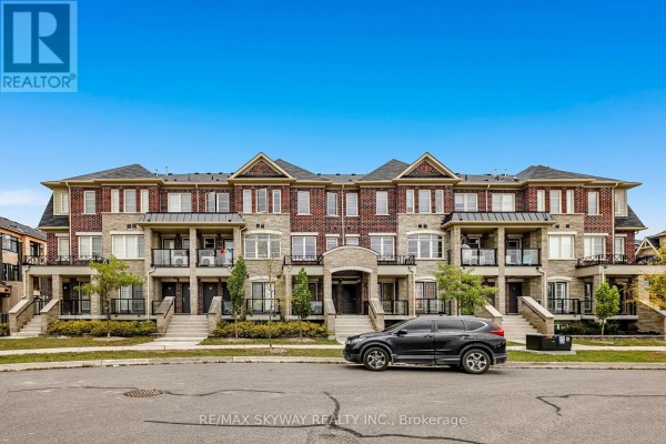 Modern townhouses with brick and stone facades, balconies - 10 - 200 Veterans Drive, Brampton