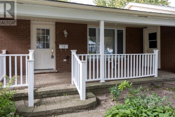 Close-up of the white railing and brick steps leading to the front door. - 10 Dunsford Crescent, St  Marys