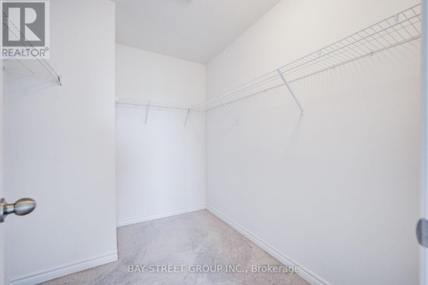 Empty bedroom with two windows - 10 Elsegood Drive Guelph