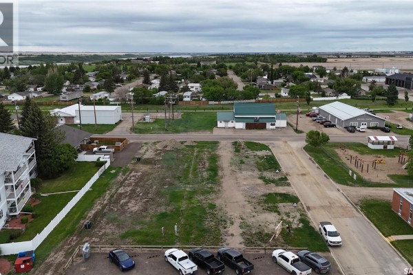Aerial view showing multiple lots for sale, including 100-102 Thomson, with snow coverage. - 100-102 Thomson Street, Outlook