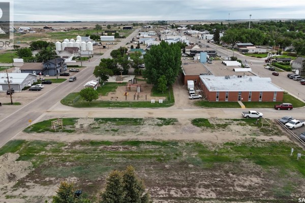 Wide shot of the lot at 100-102 Thomson, showing surrounding area and snow-covered ground. - 100-102 Thomson Street, Outlook
