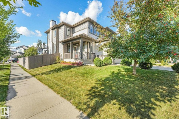Family room - 100 Rideau Pl, Beaumont, AB T4X1Z6 Photo 4