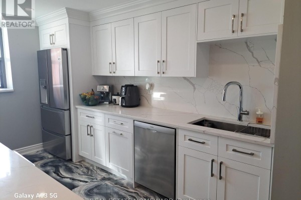 Kitchen - 1810 - 100 Wingarden Court, Toronto, ON M1B2P4 Photo 3