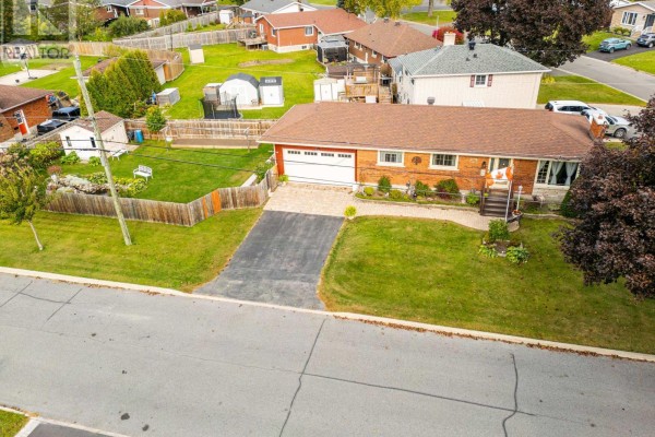 Aerial view of the brick bungalow, driveway, and backyard. - 1001 Edythe Avenue, Cornwall