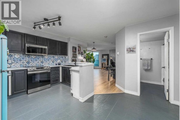 Kitchen - 1004, 1121 6 Avenue Sw, Calgary, AB T2P5J4 Photo 2