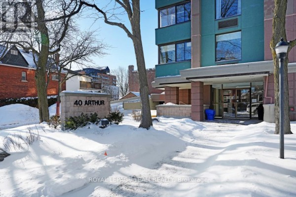 40 Arthur building entrance with snow and trees - 1004 - 40 Arthur Street E Ottawa