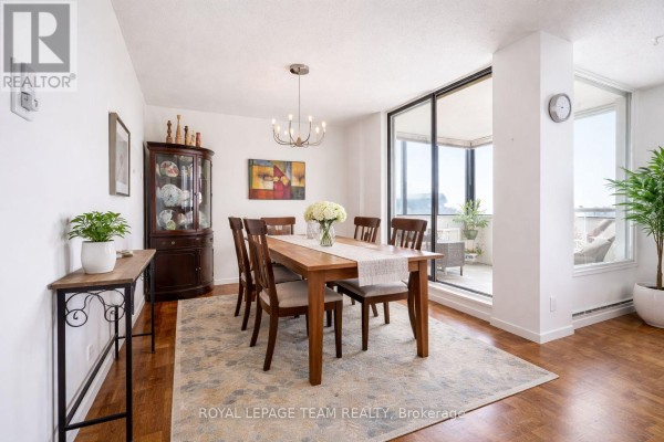 Wooden dining set and china cabinet with balcony access - 1004 - 40 Arthur Street E Ottawa