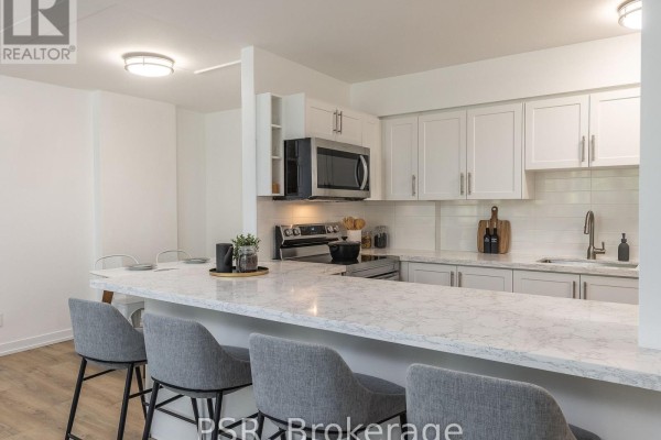 Kitchen - 1006 - 240 Markland Drive, Toronto, ON M9C1R3 Photo 3