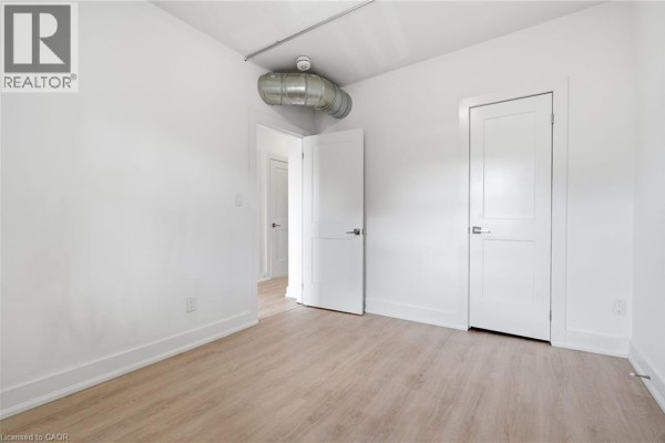 Living room - 1006 King Street E Unit# 02, Hamilton, ON L8M1C8 Photo 5