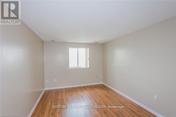 Bedroom 2 - 1007 - 30 Chapman Court, London North, ON N6G4Y4 Photo 4