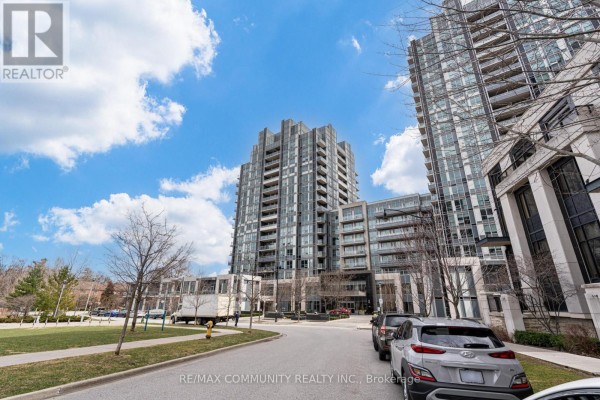 Two tall condo towers with glass balconies stand against a cloudy sky. - 1008 - 120 Harrison Garden Boulevard, Toronto