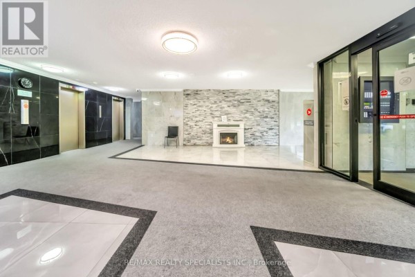 Living room - 1008 - 4 Kings Cross Road, Brampton, ON L6T3X8 Photo 5