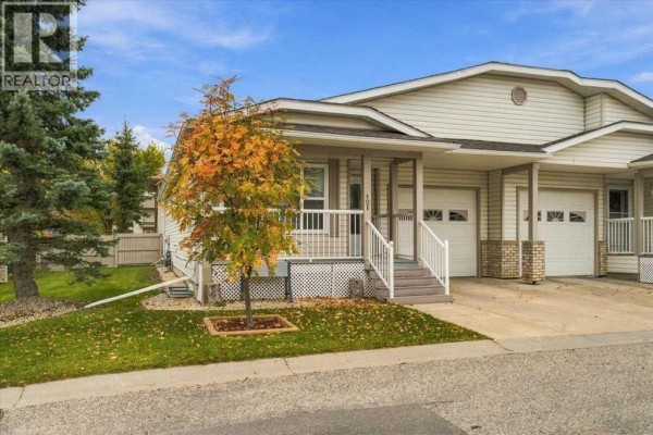 Duplex for sale at 101, 10550 111 Street N, Grande Prairie, AB - MLS® 2ybRed