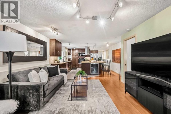 Primary Bedroom - 101, 1311 15 Avenue Sw, Calgary, AB T3C0X8 Photo 5