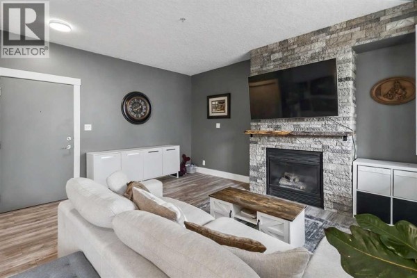 Living room - 101, 3501 15 Street Sw, Calgary, AB T2T4A4 Photo 5