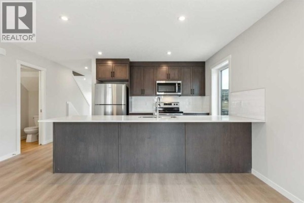 Dining room - 101, 63 Belmont Passage Sw, Calgary, AB T2X4H7 Photo 4