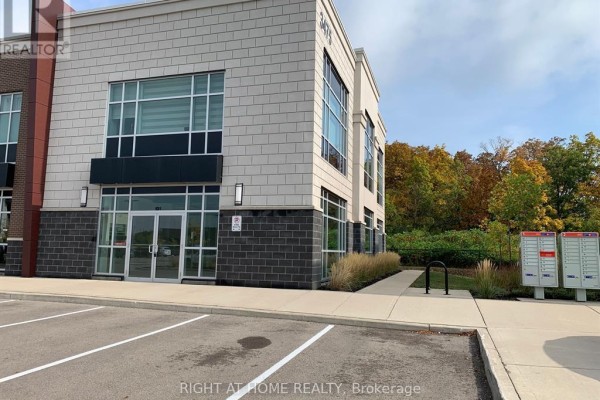 101 - 3475 Rebecca Street, Oakville, ON L6L0H3 Photo 2