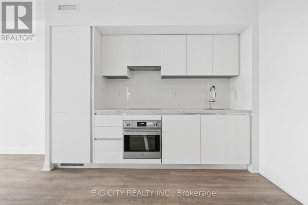 Living room - 1011 - 25 Frederick Todd Way, Toronto, ON M4G4E8 Photo 3