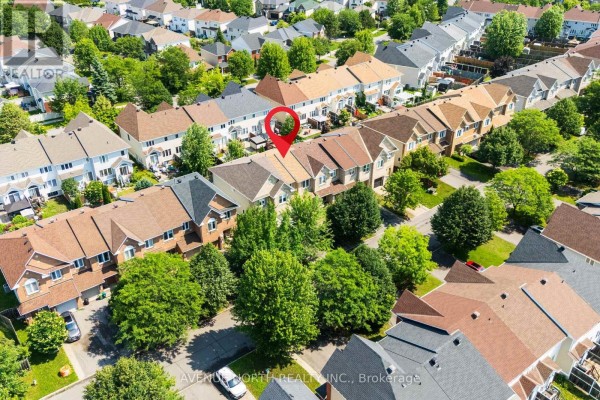 Aerial view showing the subject townhouse and its position within the street. - 1015 Candlewood Street, Ottawa