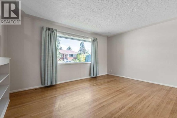 Bedroom - 1015 Mackid Road Ne, Calgary, AB T2E6A8 Photo 5
