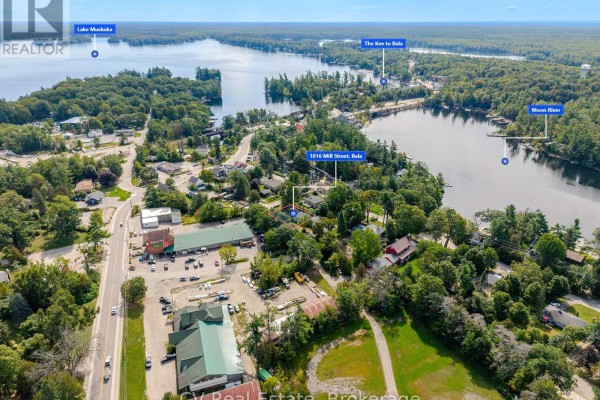 Aerial overview of the Muskoka Lakes area, featuring the property's location near Lake Muskoka and Bala. - 1016 Mill Street, Muskoka Lakes