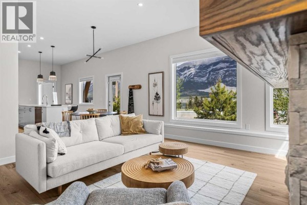 Living room/Dining room - 101k, 209 Stewart Creek Rise, Canmore, AB T1W0N9 Photo 2