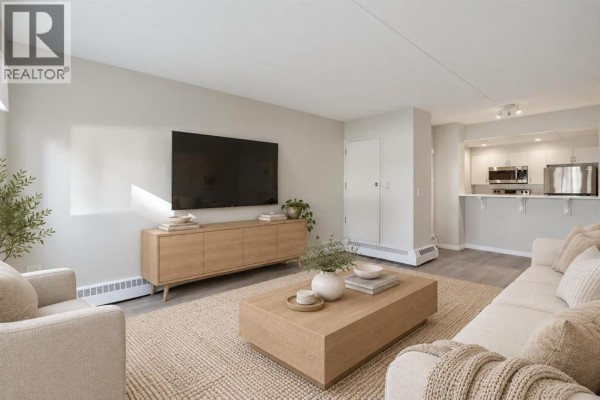 Living room - 102, 1414 12 Street Sw, Calgary, AB T3C3T2 Photo 3