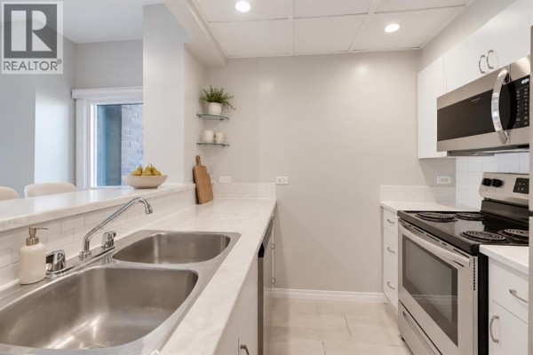 Kitchen - 102, 1414 12 Street Sw, Calgary, AB T3C3T2 Photo 5