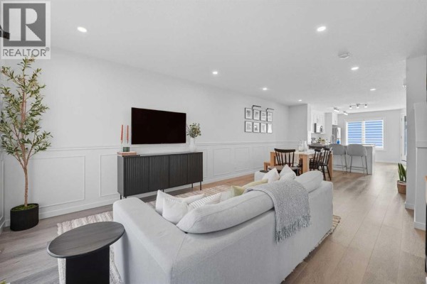 Living room - 102, 474 Seton Circle Se, Calgary, AB T3M3P6 Photo 4