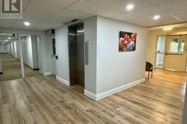 Living room - 102 - 1100 Millwood Avenue, Brockville, ON K6V6Z3 Photo 3