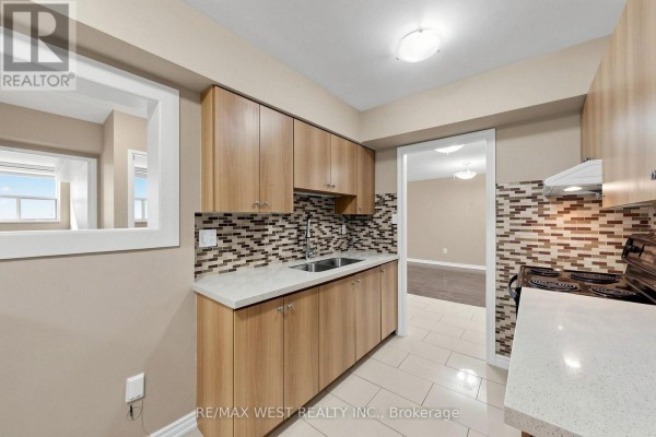 Bedroom 2 - 102 - 370 Dixon Road, Toronto, ON M9R1T2 Photo 5