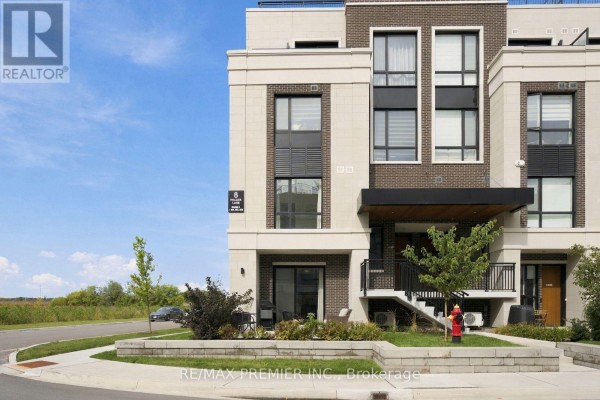 Close-up of the entrance to townhouse unit 8 with brick and stone facade. - 102 - 8 Walder Lane, Richmond Hill
