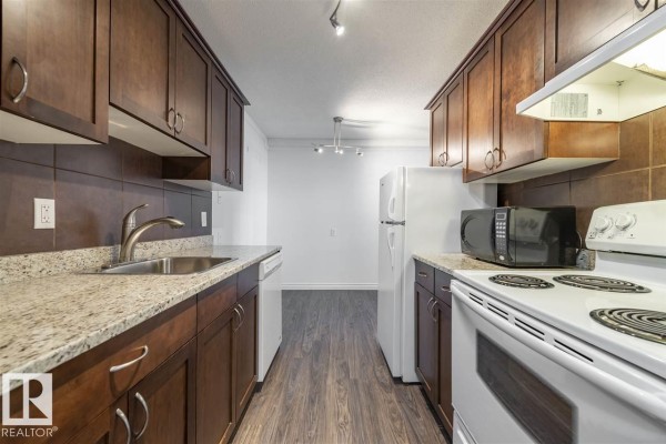 #102 10633 81 Av Nw, Edmonton, AB T6E1Y1 Photo 5